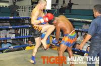 Regan land awesome knee strike to head in Tiger Muay thai fight, Phuket, thailand