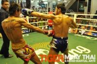 Ritt (Tiger Muay Thai) scores left hook